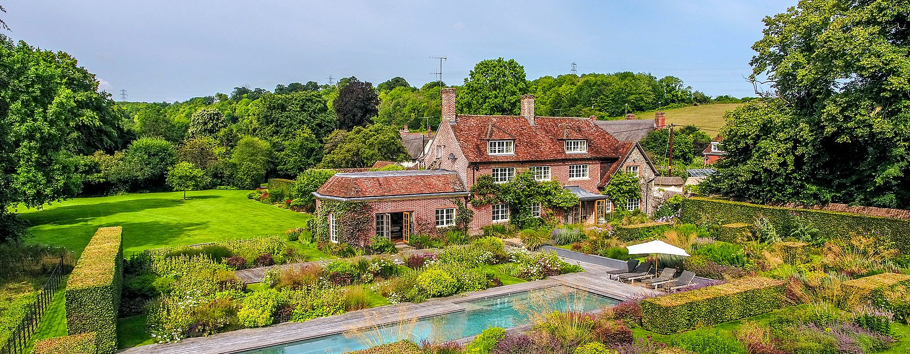 A country house and its gardens, of the kind Sofito surveys