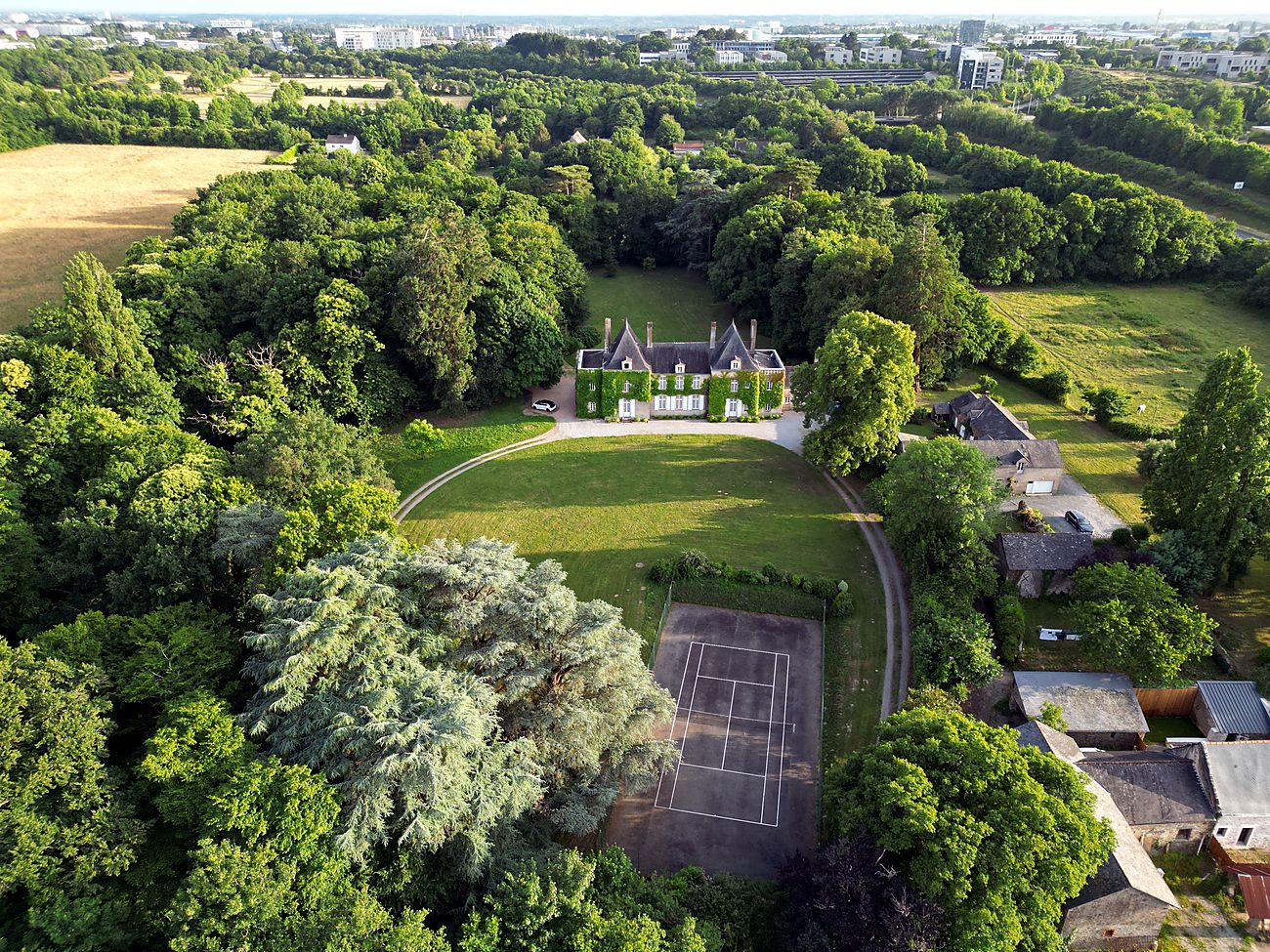 Aerial view of a French château and grounds in the Loire Valley surveyed for acquisition