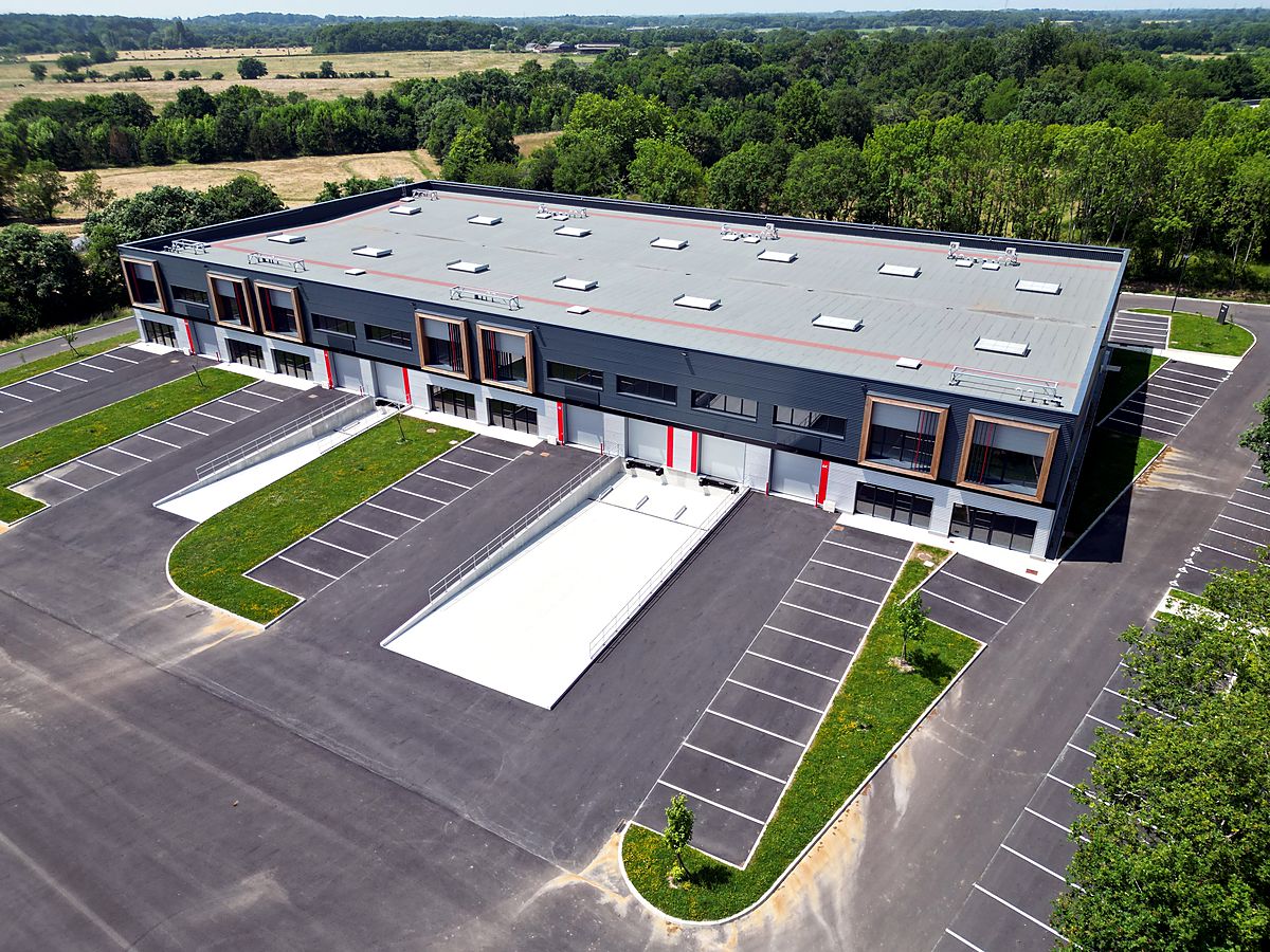Aerial view of modern industrial and logistics units in the Loire Valley, France