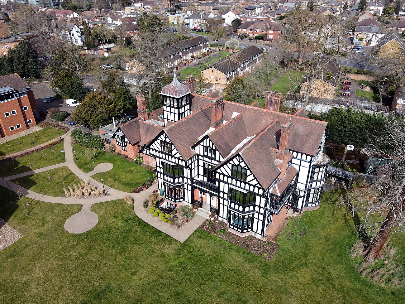 Aerial view of the Tudor-revival headquarters of the National Foundation for Educational Research and its grounds